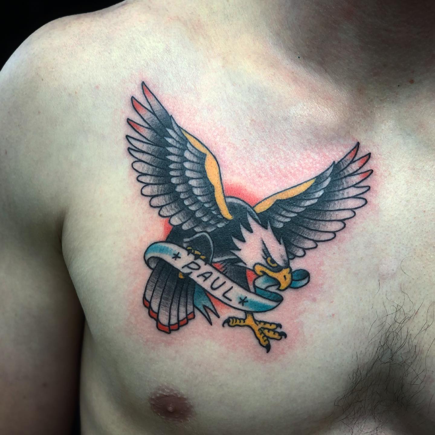Eagle American traditional tattoo on the chest by Dave Shurman