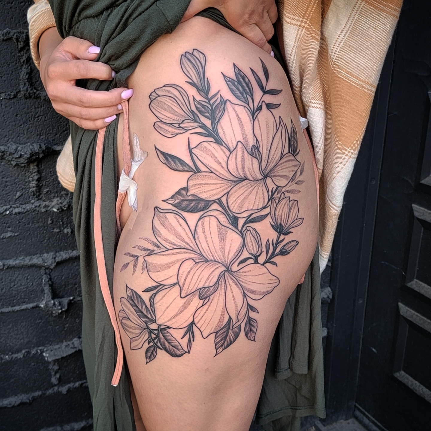 Floral bouquet dotwork tattoo on the thigh by all gas no brakes! no days off!