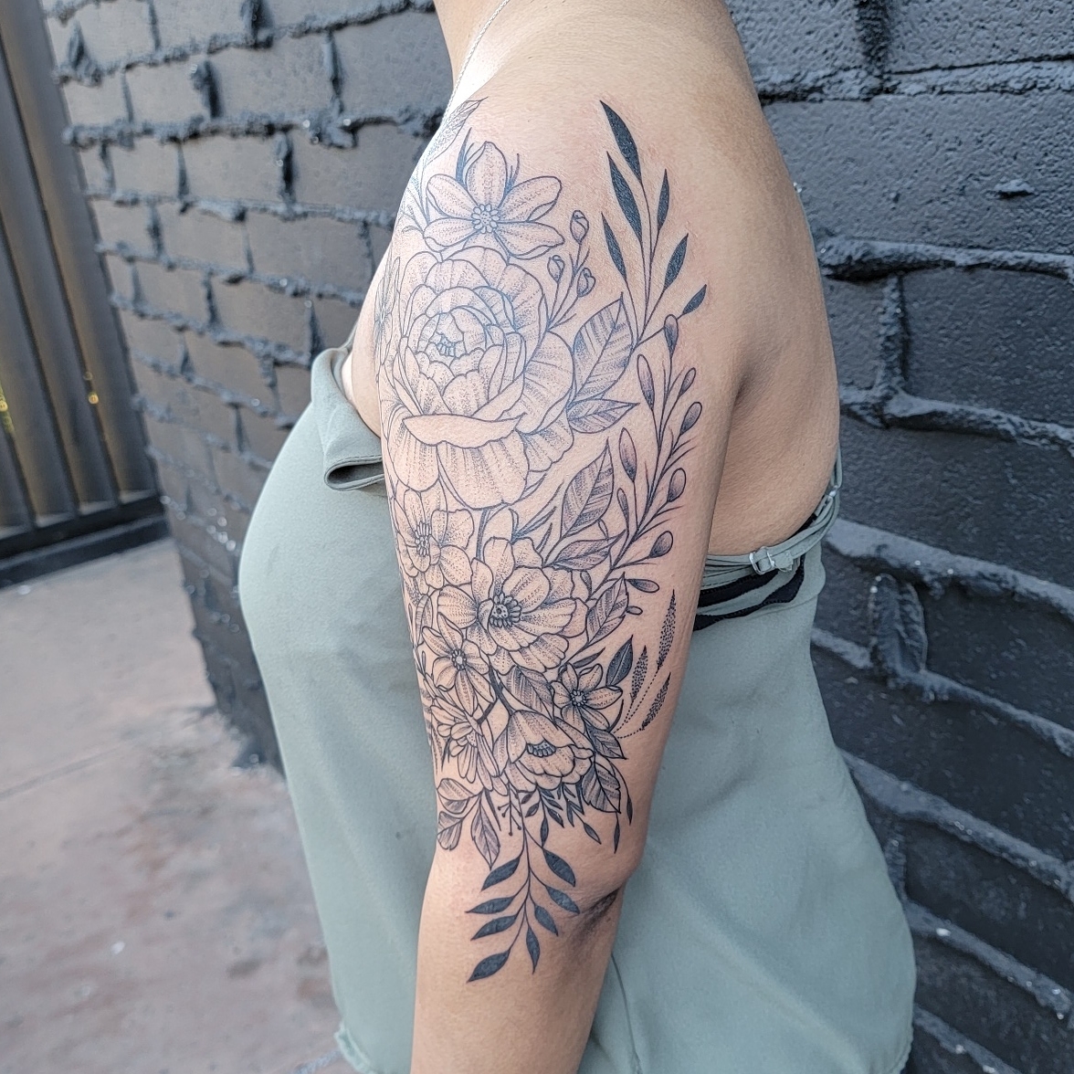 Floral bouquet black and grey tattoo on the forearm by all gas no brakes! no days off!