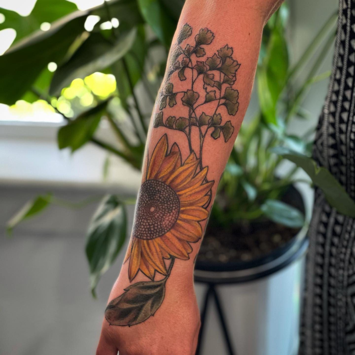 Sunflower dotwork tattoo on the forearm by 𝓚𝓪𝓼𝓼𝓪𝓷𝓭𝓻𝓪 𝓜𝓬𝓒𝓪𝓵𝓵, Eugene, Oregon