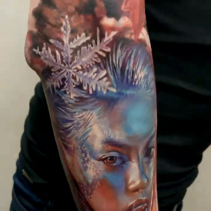 Woman with snowflakes realism tattoo by Dmitriy Paramonov πΊπ¦