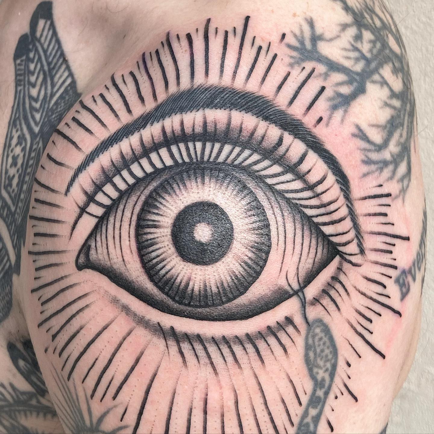 Eye realism tattoo on the forearm by Rob Banks
