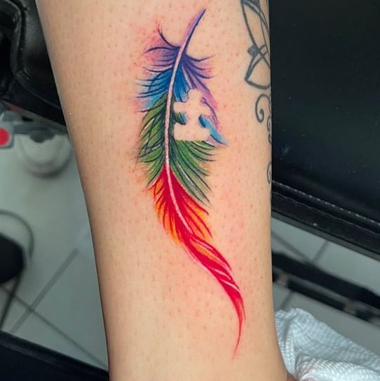 Tattoo by @jonnyriostattoo — watercolor
