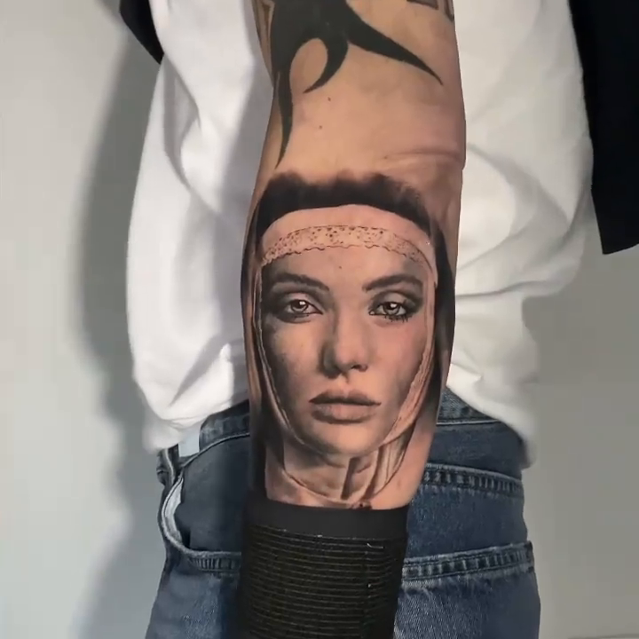 Woman's portrait realism tattoo by Remko
