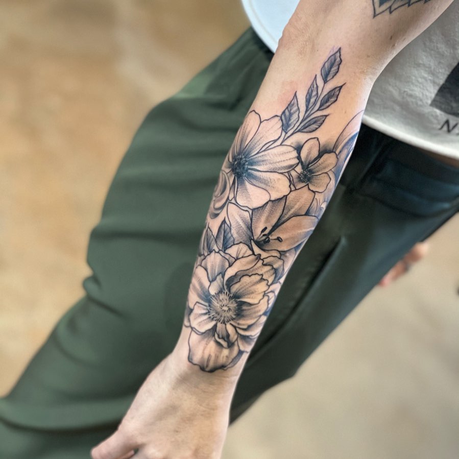 Floral bouquet black and grey tattoo on the forearm by Mikeyftsk2
