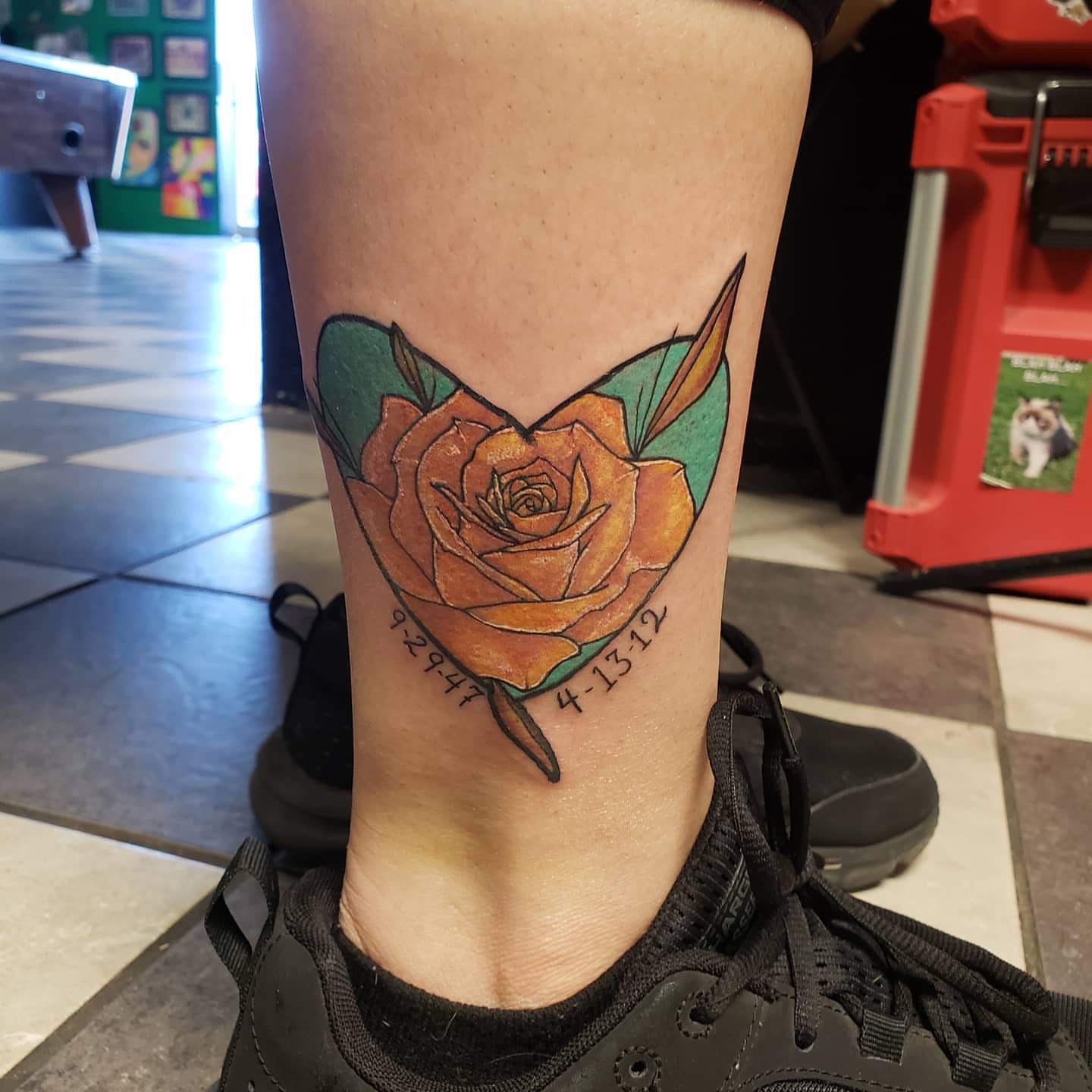 Rose realism tattoo on the calf by Glen Wallis