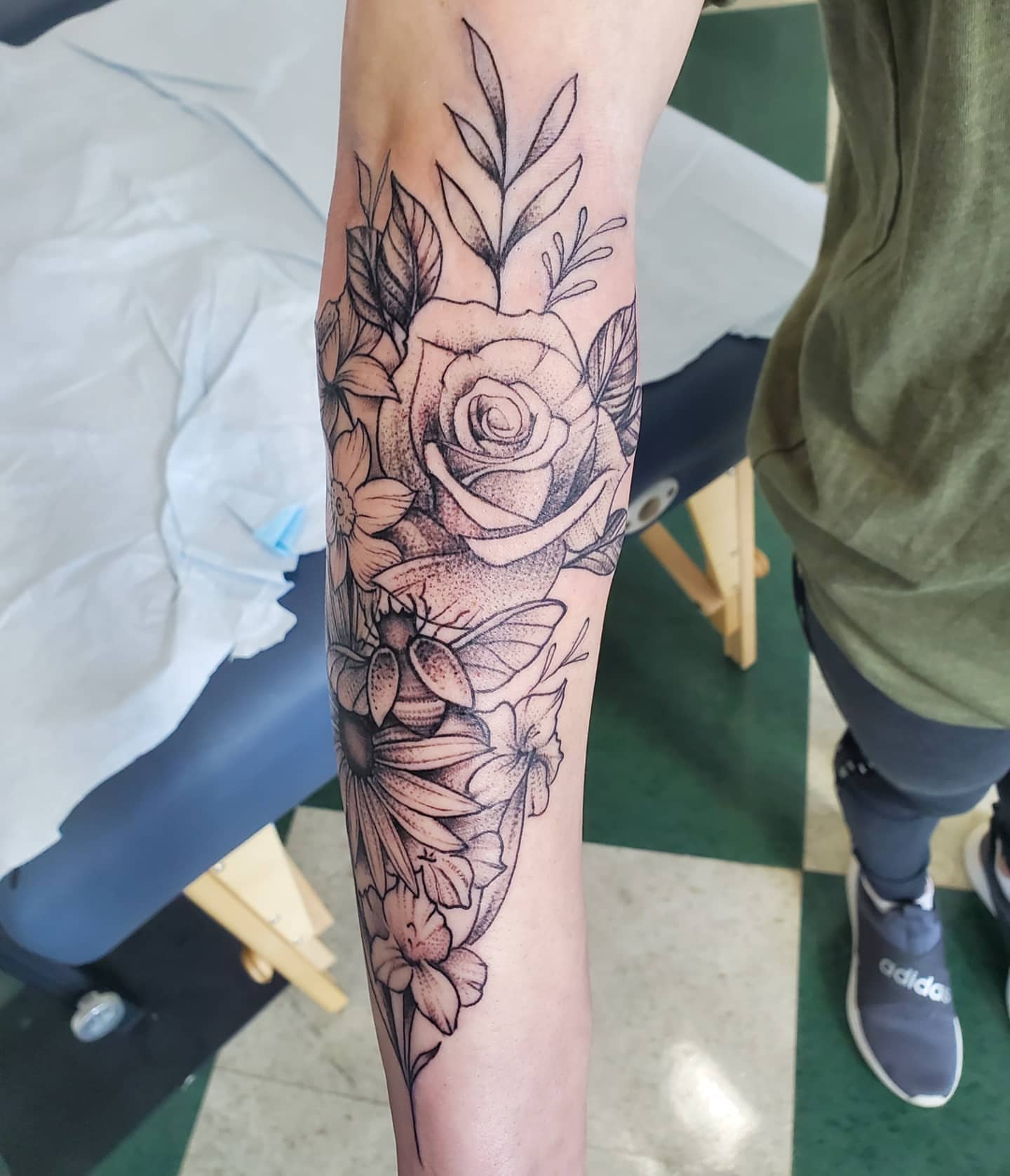 Floral arrangement dotwork tattoo on the forearm by David Nash, Evansville, Indiana