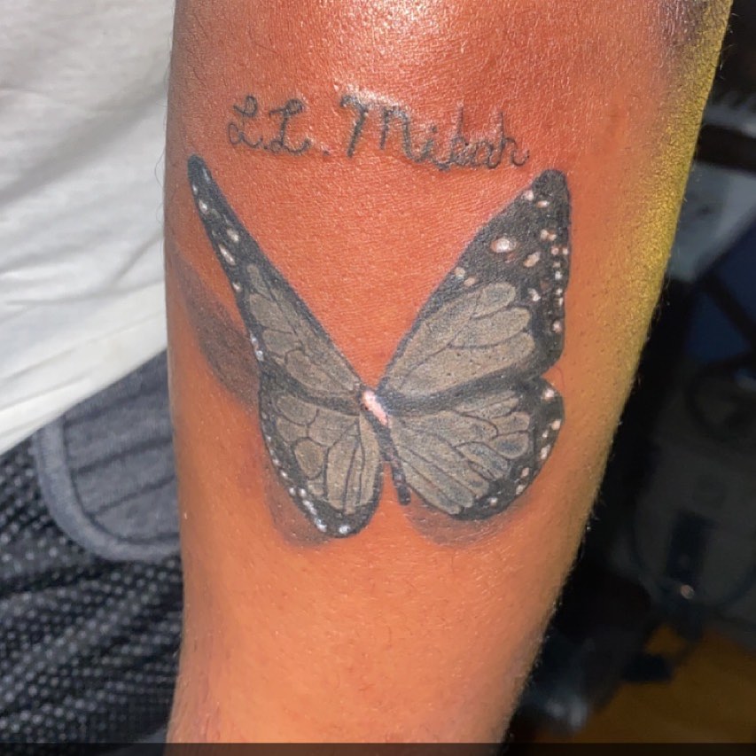 Butterfly dotwork tattoo on the forearm by Daniel Monyongo