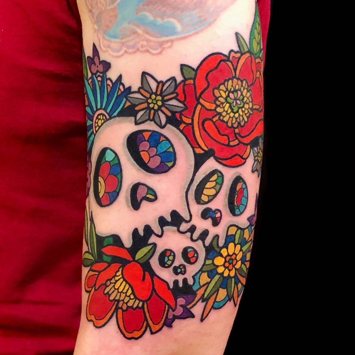 Sugar skull Chicano tattoo on the forearm by David Mendieta