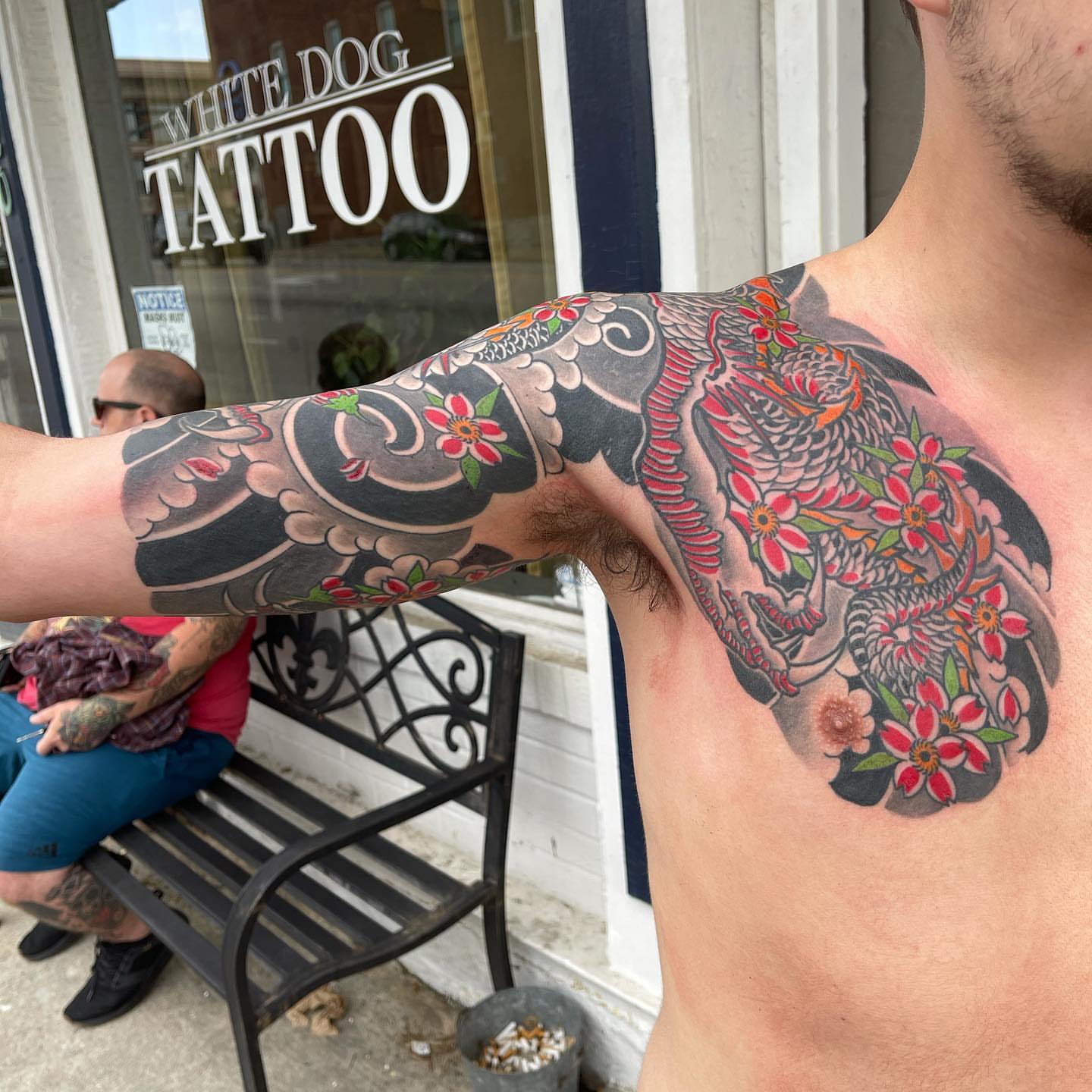 Dragon and flowers japanese irezumi tattoo on the shoulder by Chris Rogers