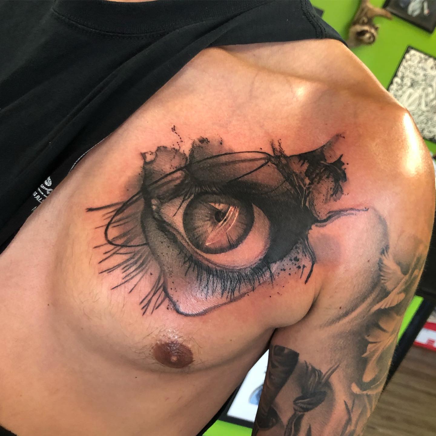 Eye realism tattoo on the chest by Nick Jones (Buttonsandfaders)