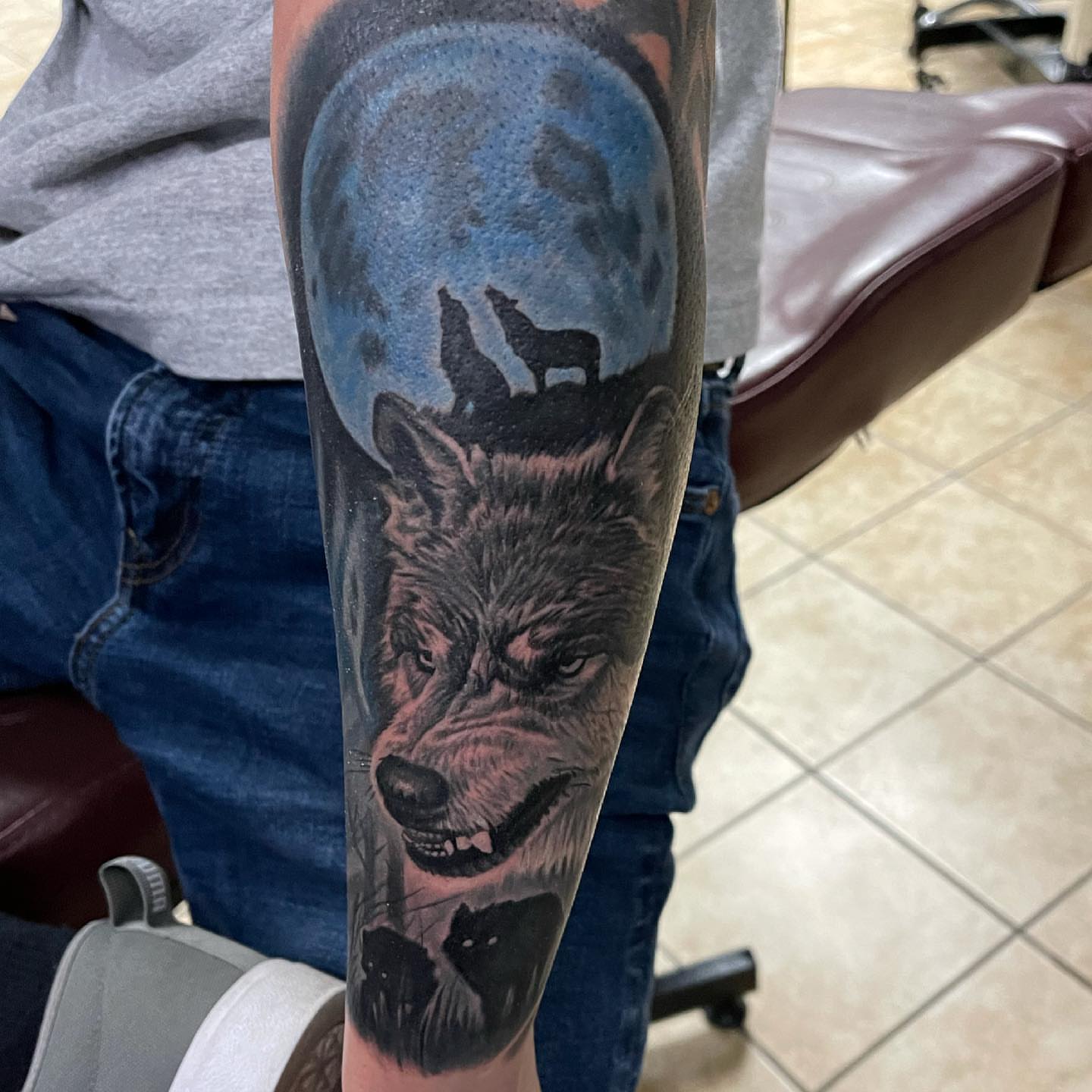 Wolf realism tattoo on the forearm by Gary Graves