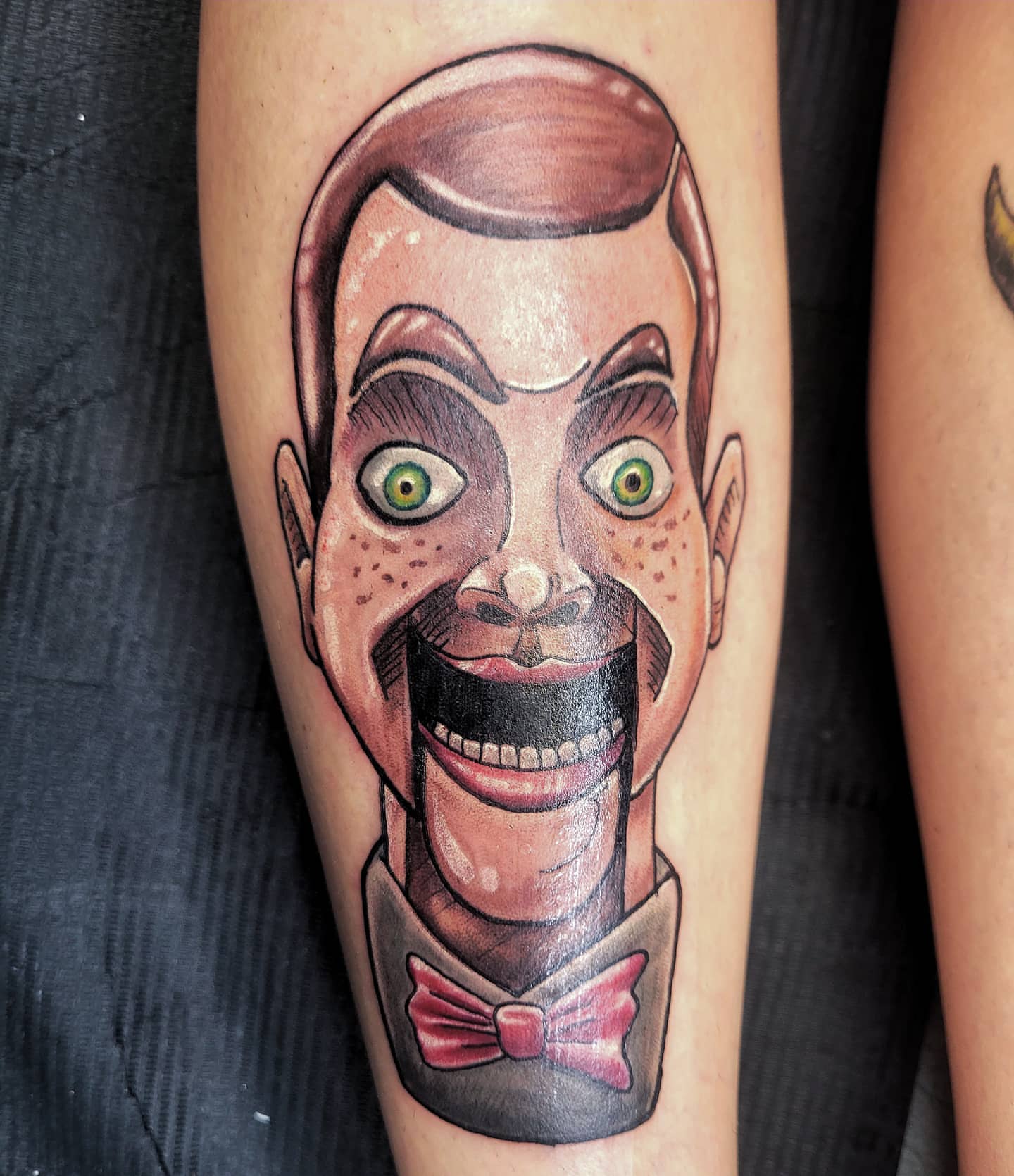 Clown head realism tattoo on the forearm by Glen Wallis