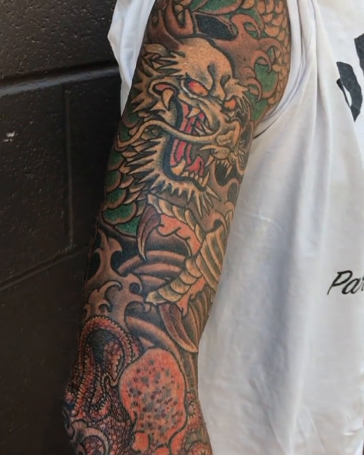 Dragon and woman with waves japanese irezumi tattoo by Brad Hill, Franklin, Tennessee