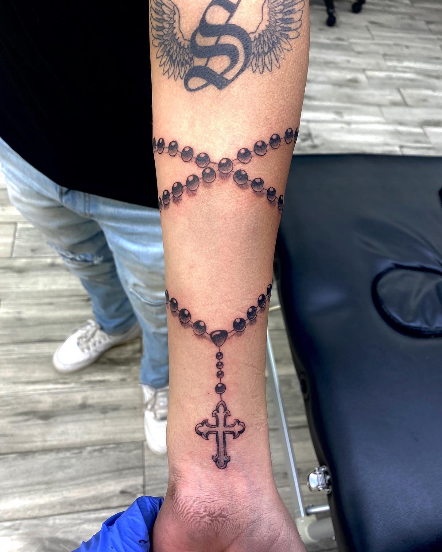 Rosary dotwork tattoo on the forearm by Monique Ortiz, Mesa, Arizona