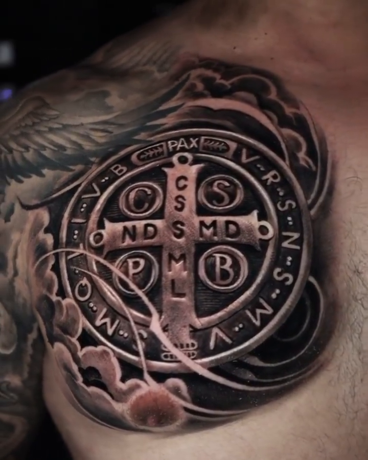 Saint Benedict medal ornamental tattoo by Tattoos By Chino