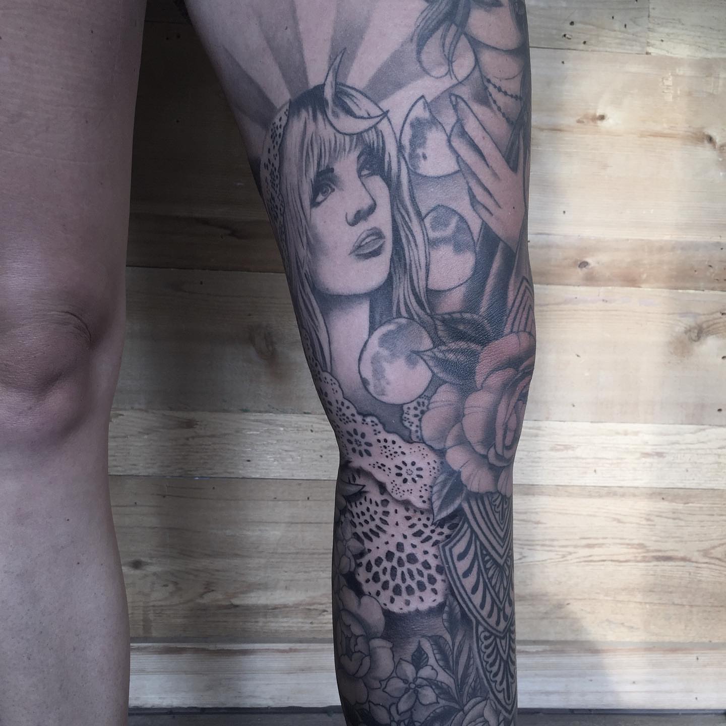 Woman with roses realism tattoo on the forearm by Sam Fortney, Columbus, Ohio