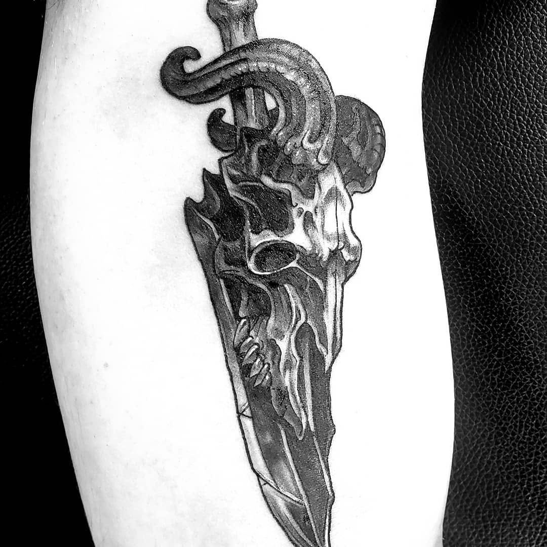 Tattoo by @tattoos_by_dopi — dark_realism, black_and_grey