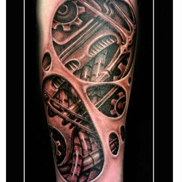 Mechanical gears geometric tattoo on the forearm by Kayden DiGiovanni, Addison, Texas