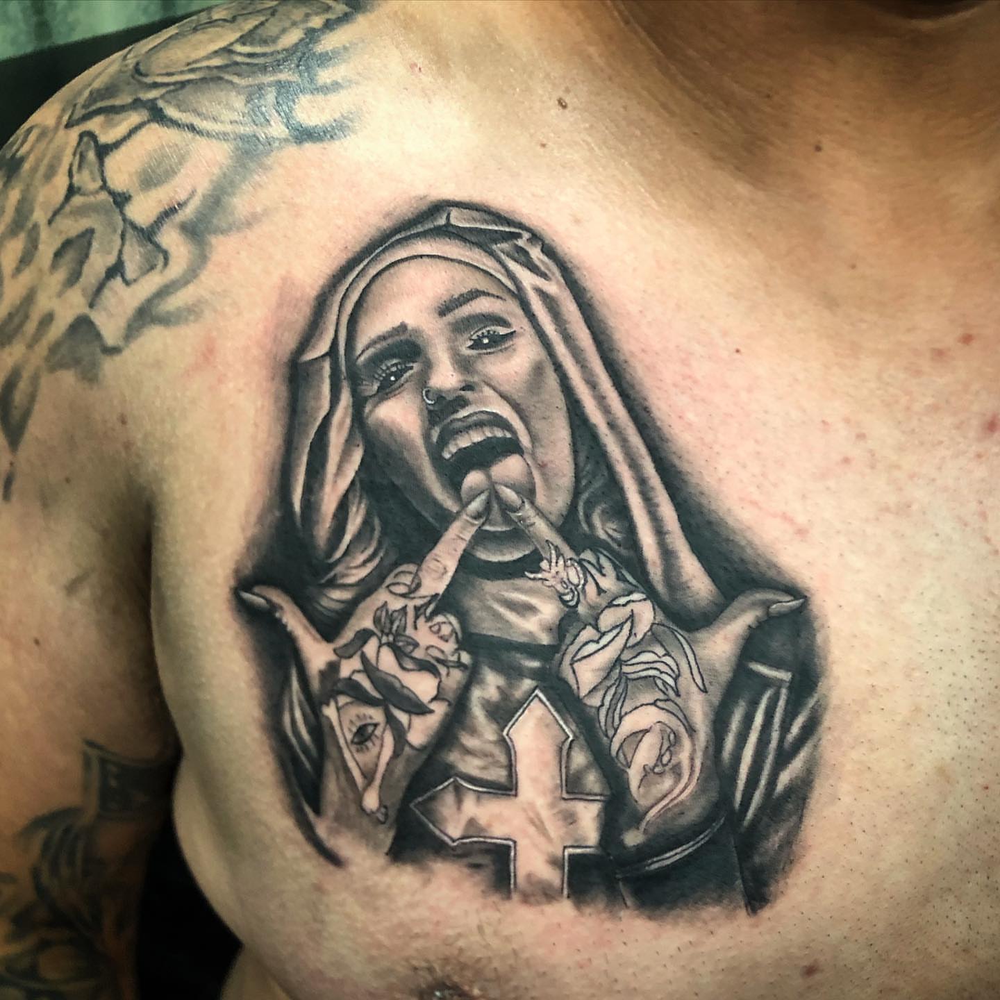 Nun realism tattoo on the chest by Tattoos by Rey G.