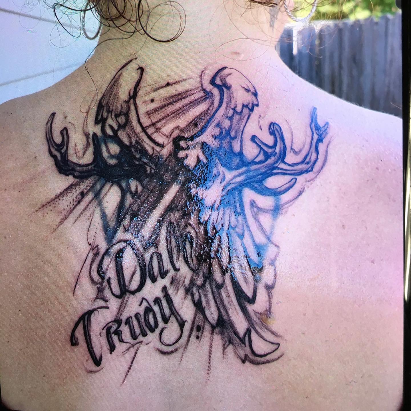 Deer and eagle American traditional tattoo on the back by Chuck House
