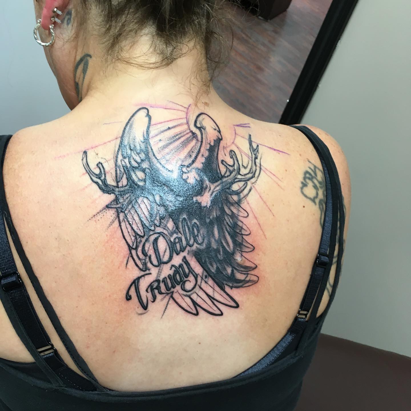Eagle American traditional tattoo on the back by Chuck House