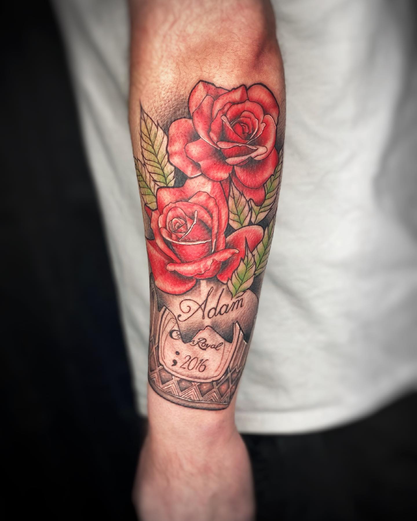 Red roses realism tattoo on the forearm by Tattoos by Hanna, Farmington Hills, Michigan
