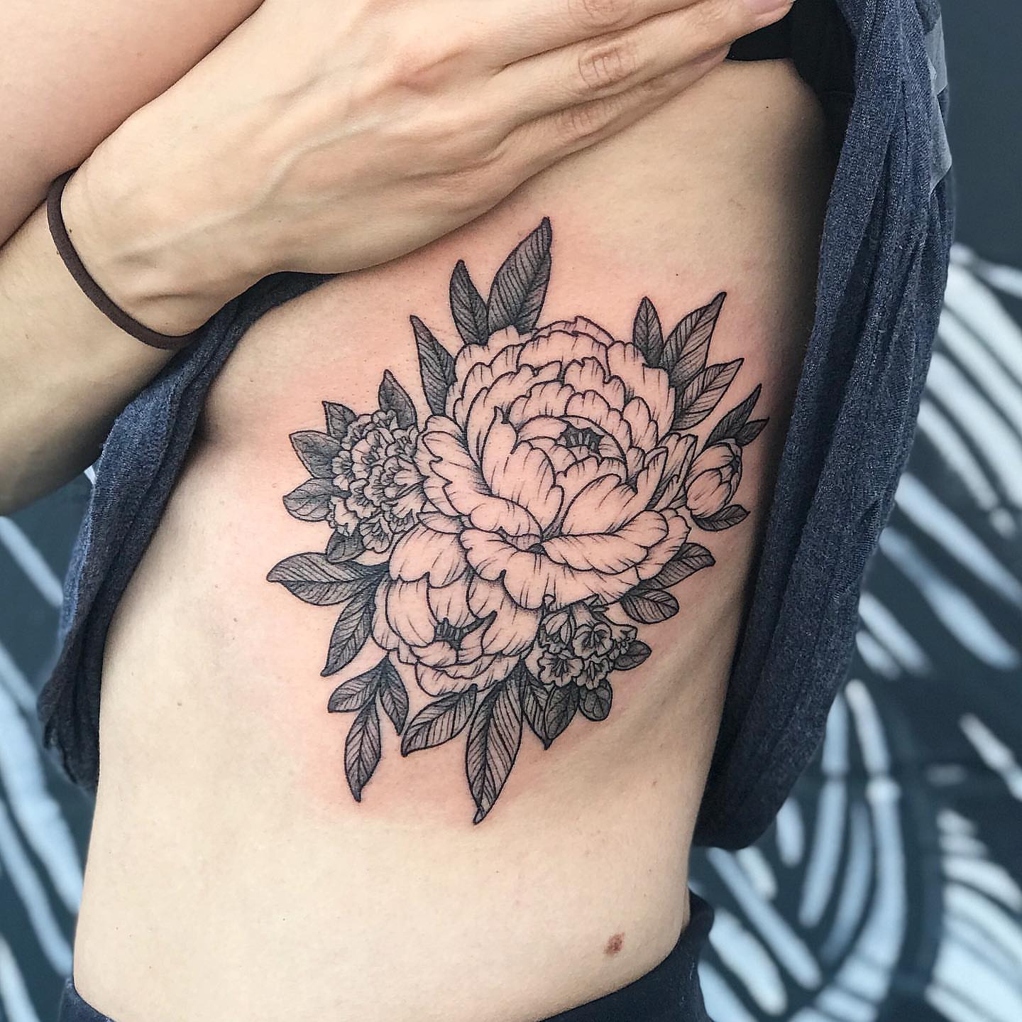 Peony bouquet black and grey tattoo on the ribs by 🍓secret k. - Austin Tattoo Artist