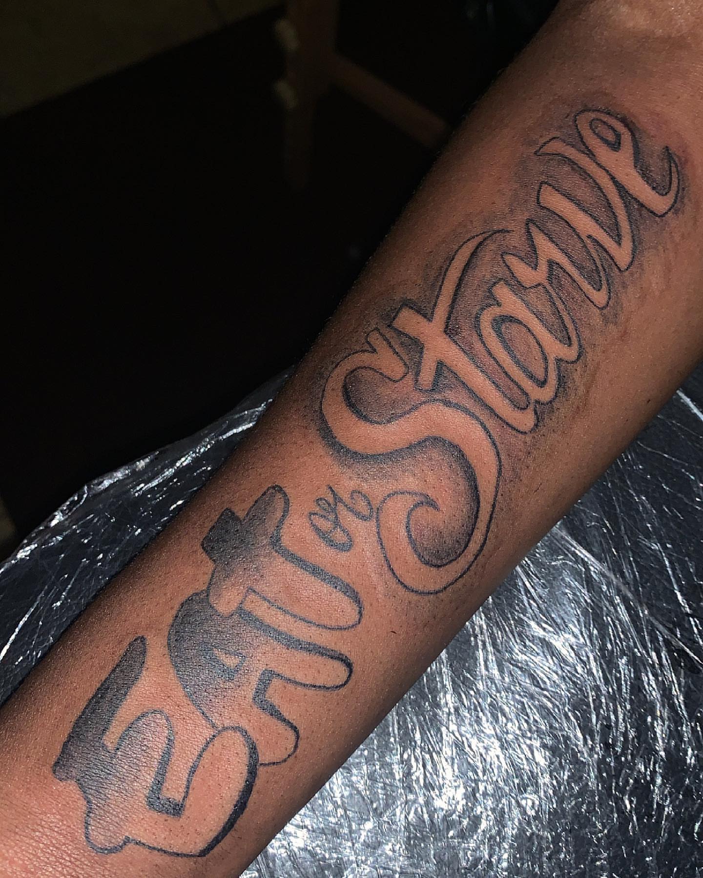 Script lettering lettering script tattoo on the forearm by groovyyinkss