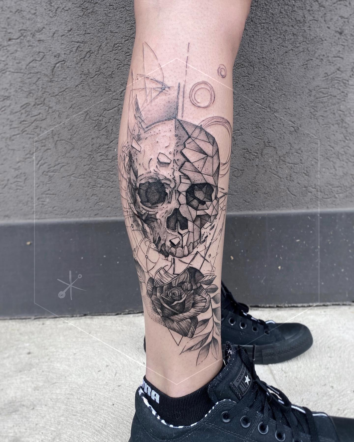 Geometric skull geometric tattoo on the calf by Jax Citriglia