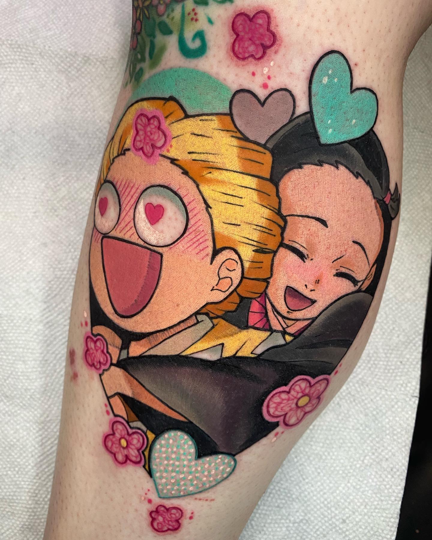 Anime characters anime tattoo on the forearm by Kara Klenk