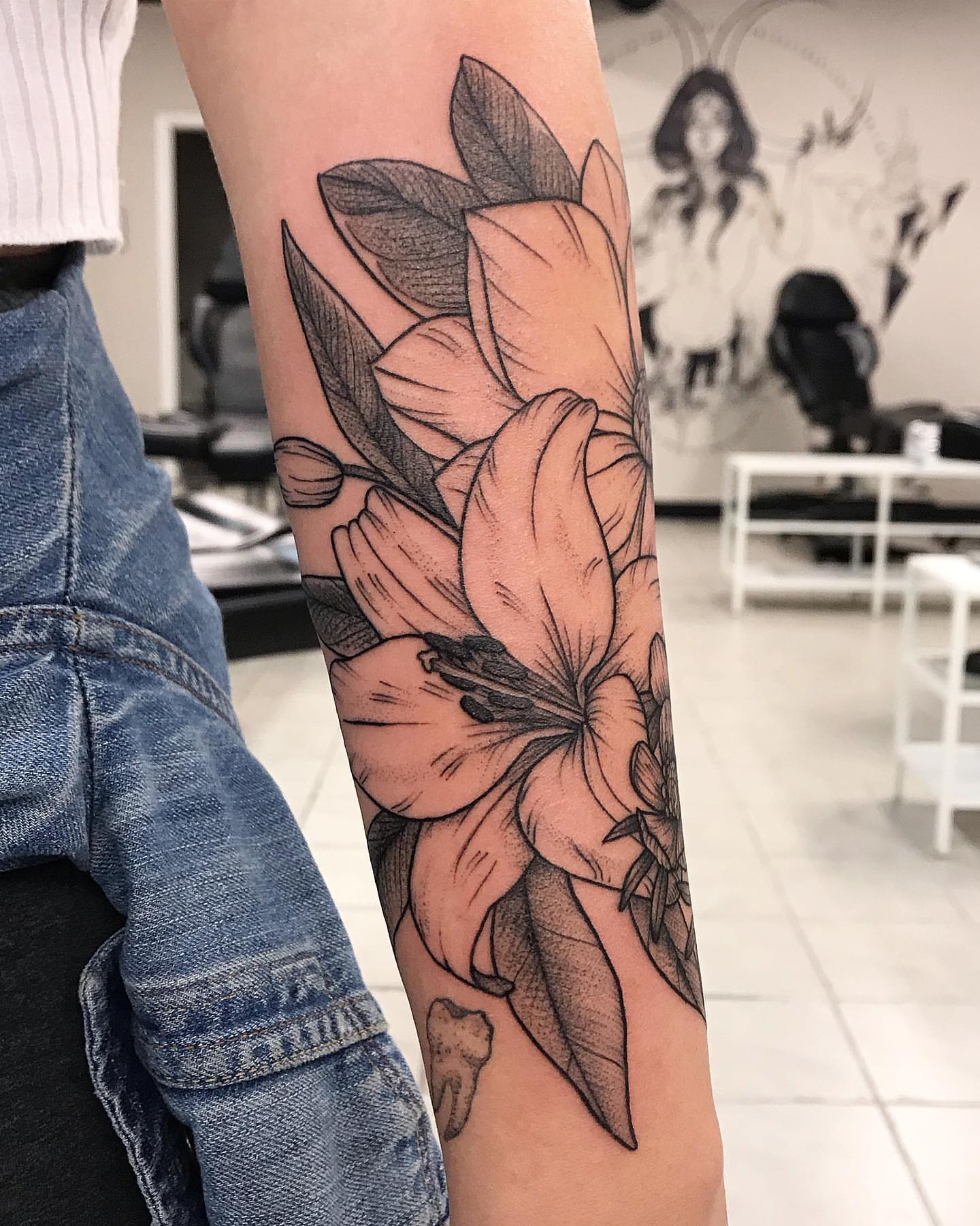 Lily black and grey tattoo on the forearm by 🍓secret k. - Austin Tattoo Artist