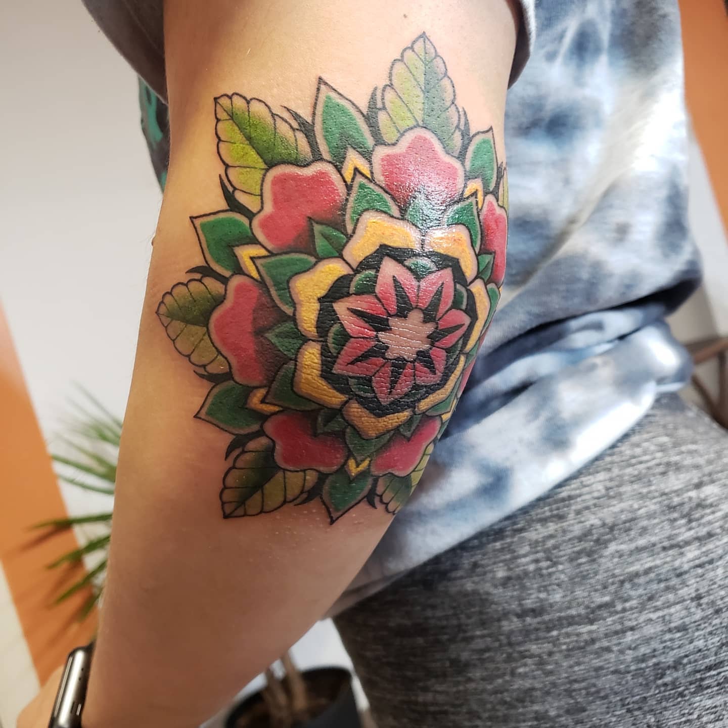 Floral arrangement American traditional tattoo on the forearm by Kayla Linton