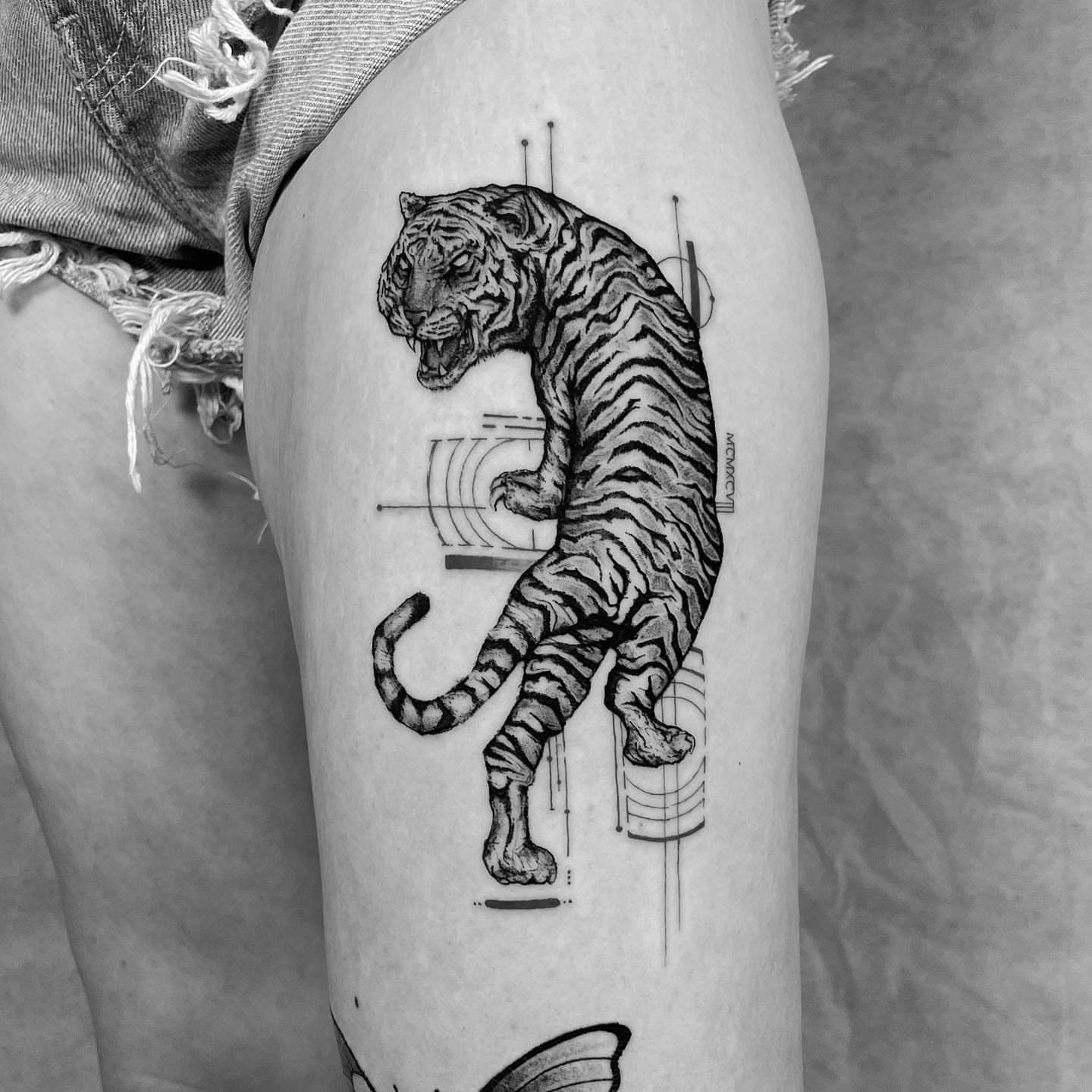 Tiger geometric tattoo on the thigh by eugene k 🌈, San Francisco, California