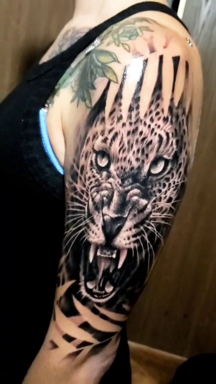 Tattoo by @david_rhapsody — realism, black_and_grey