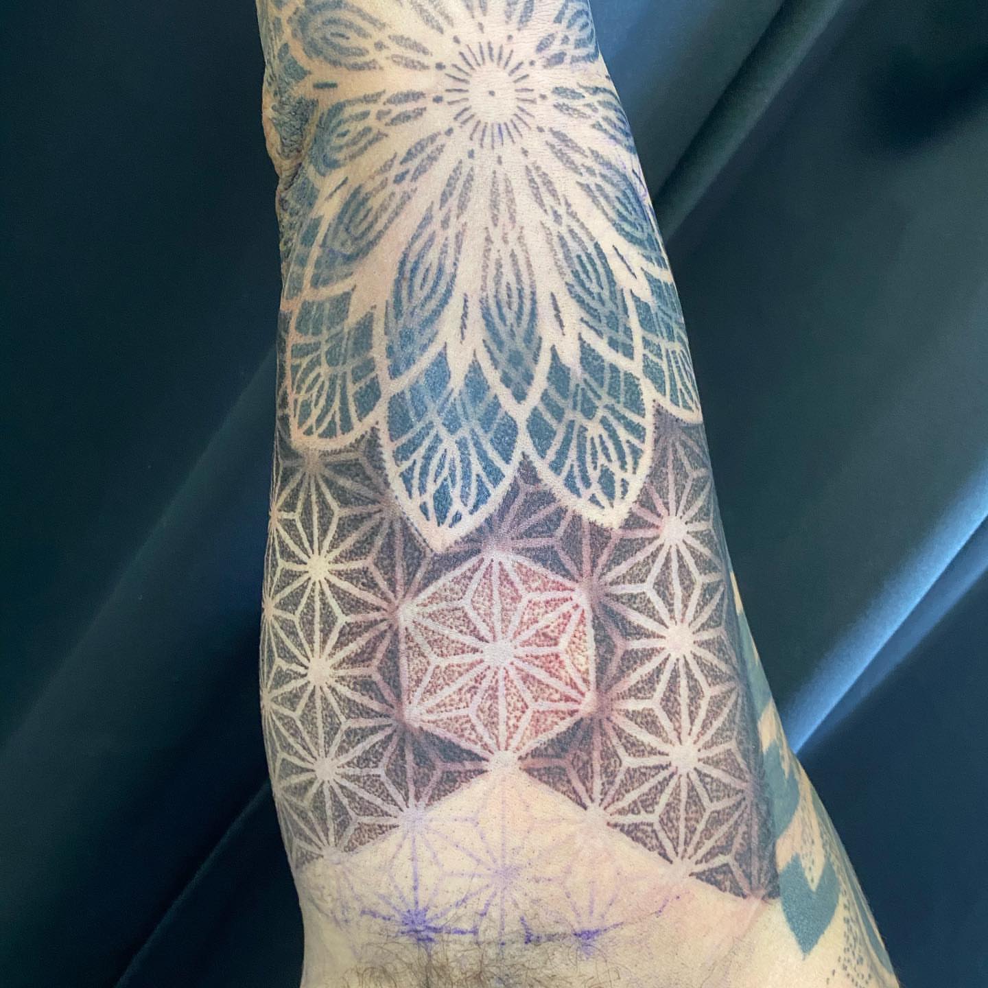 Geometric pattern geometric tattoo on the forearm by Nicholas Jones