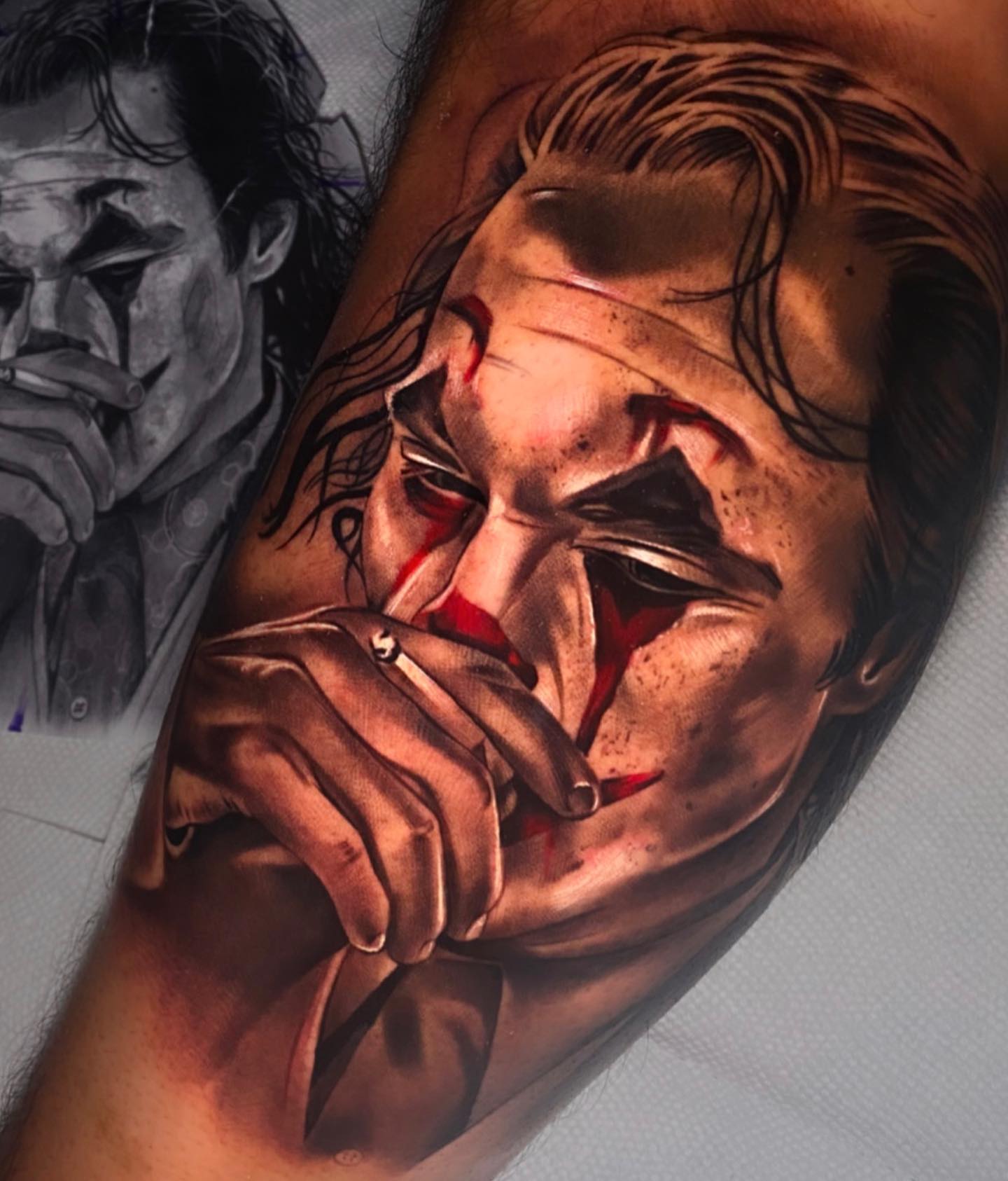 Joker smoking realism tattoo on the forearm by Ivan Guadalupe guzman