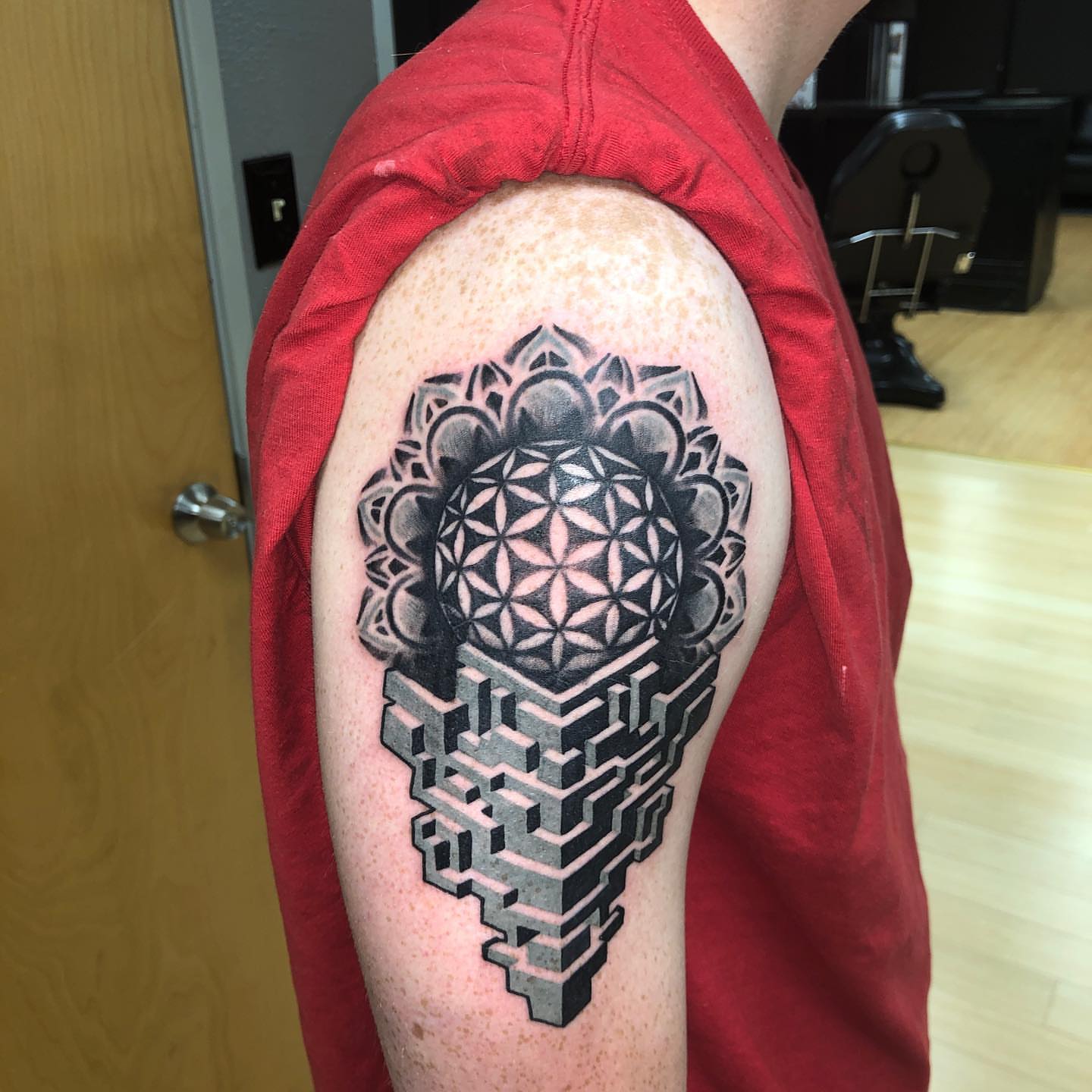 Geometric mandala geometric tattoo on the shoulder by Zac Presley