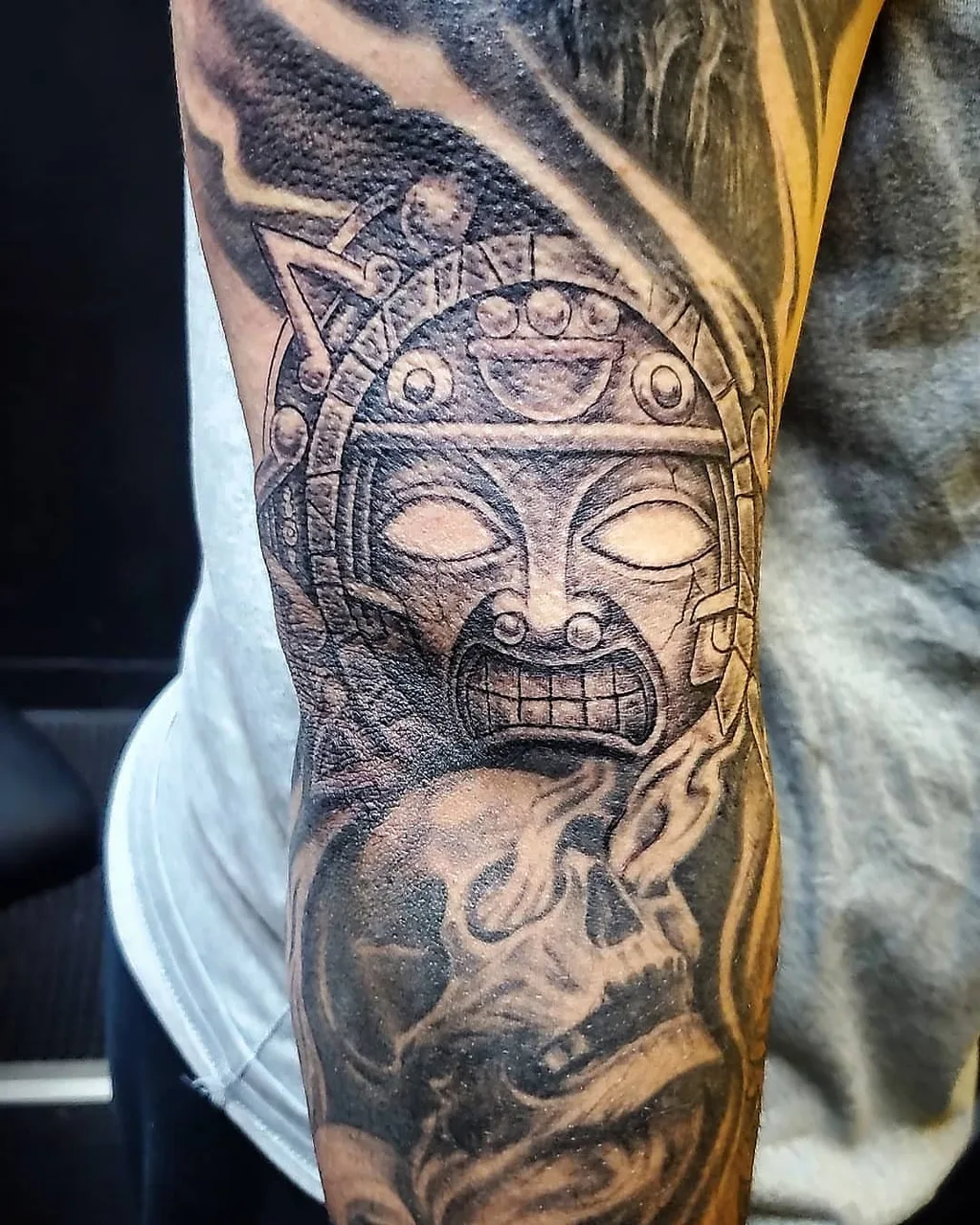 Ancient mask realism tattoo on the forearm by David Xavier Jimenez