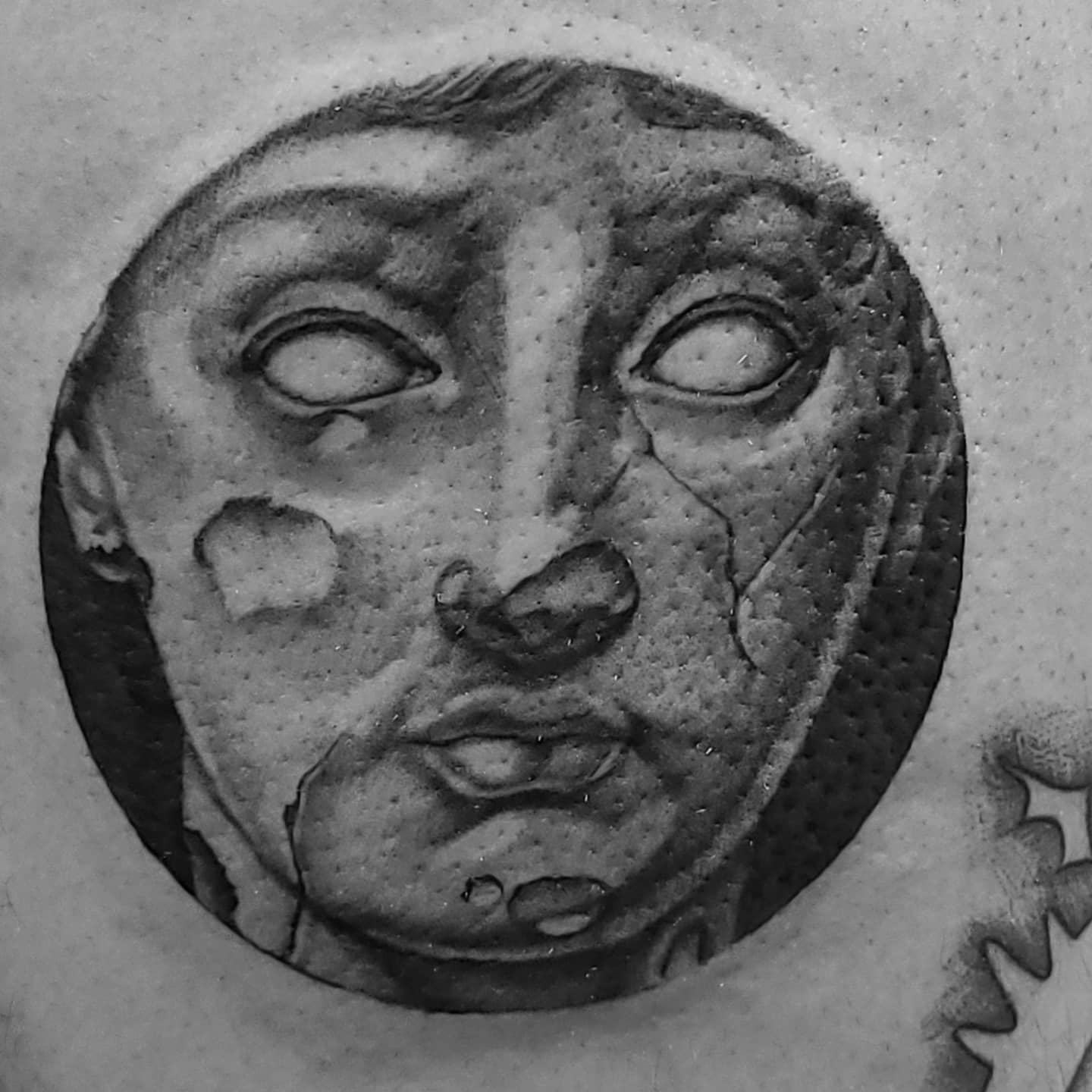 Mask black and grey tattoo by Neri Gersaint