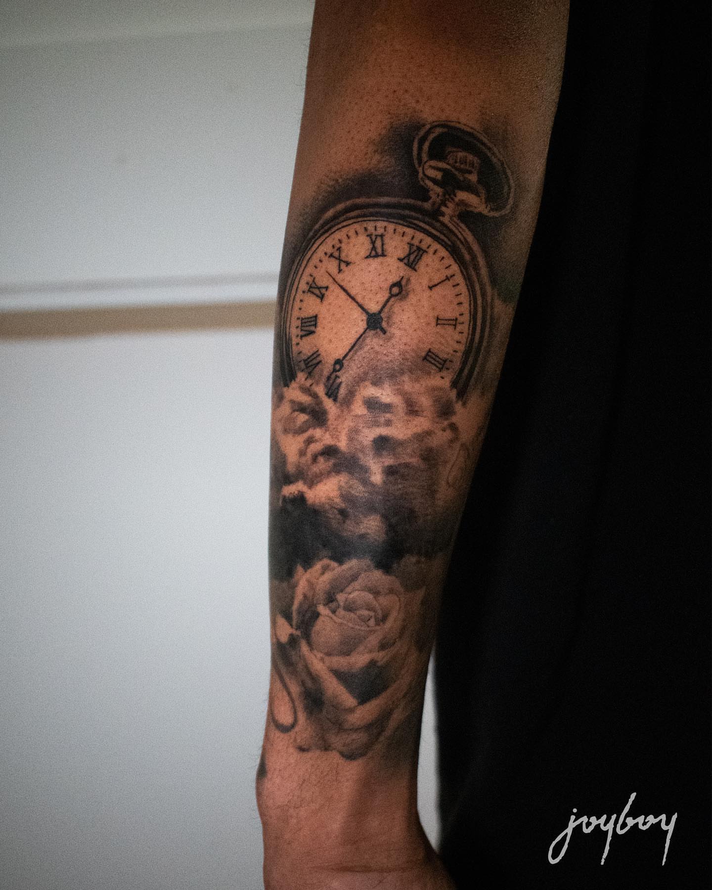 Clock and rose realism tattoo on the forearm by Joel: Boston Tattoo Artist, Boston, Massachusetts