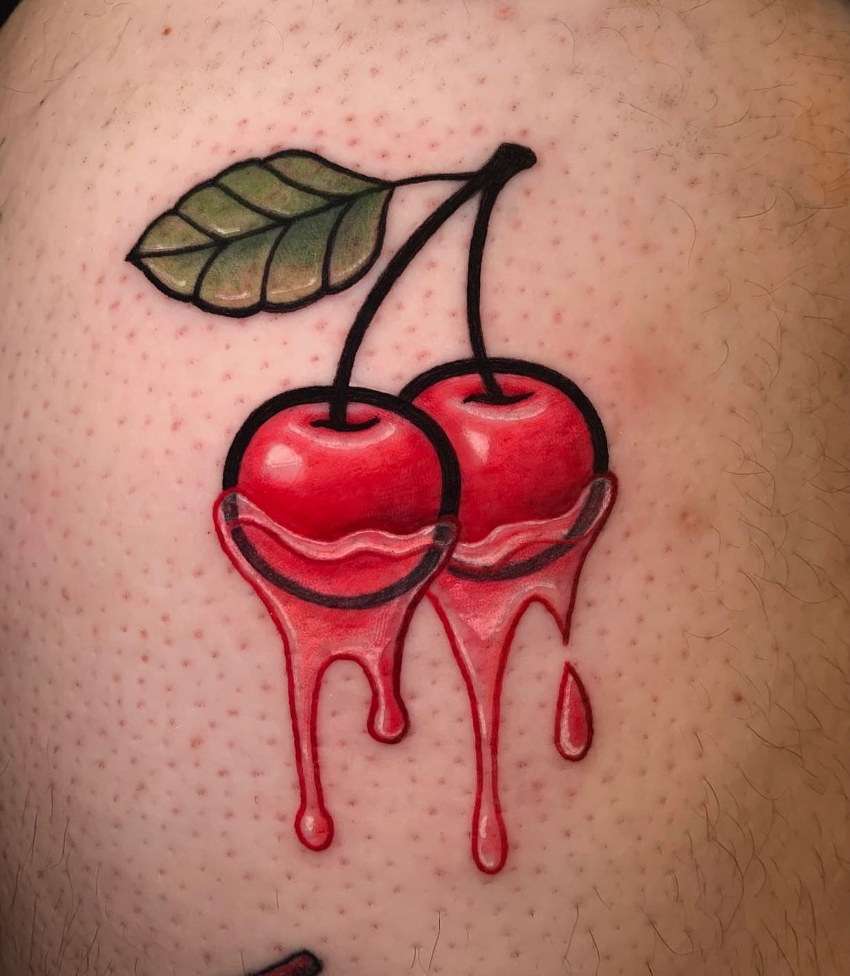 Cherry American traditional tattoo on the shoulder by Cortney Norton