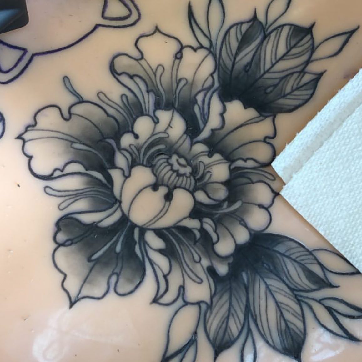 Peony flower black and grey tattoo on the chest by ដេវី  និល - Davi Nil - Tattoo Artist