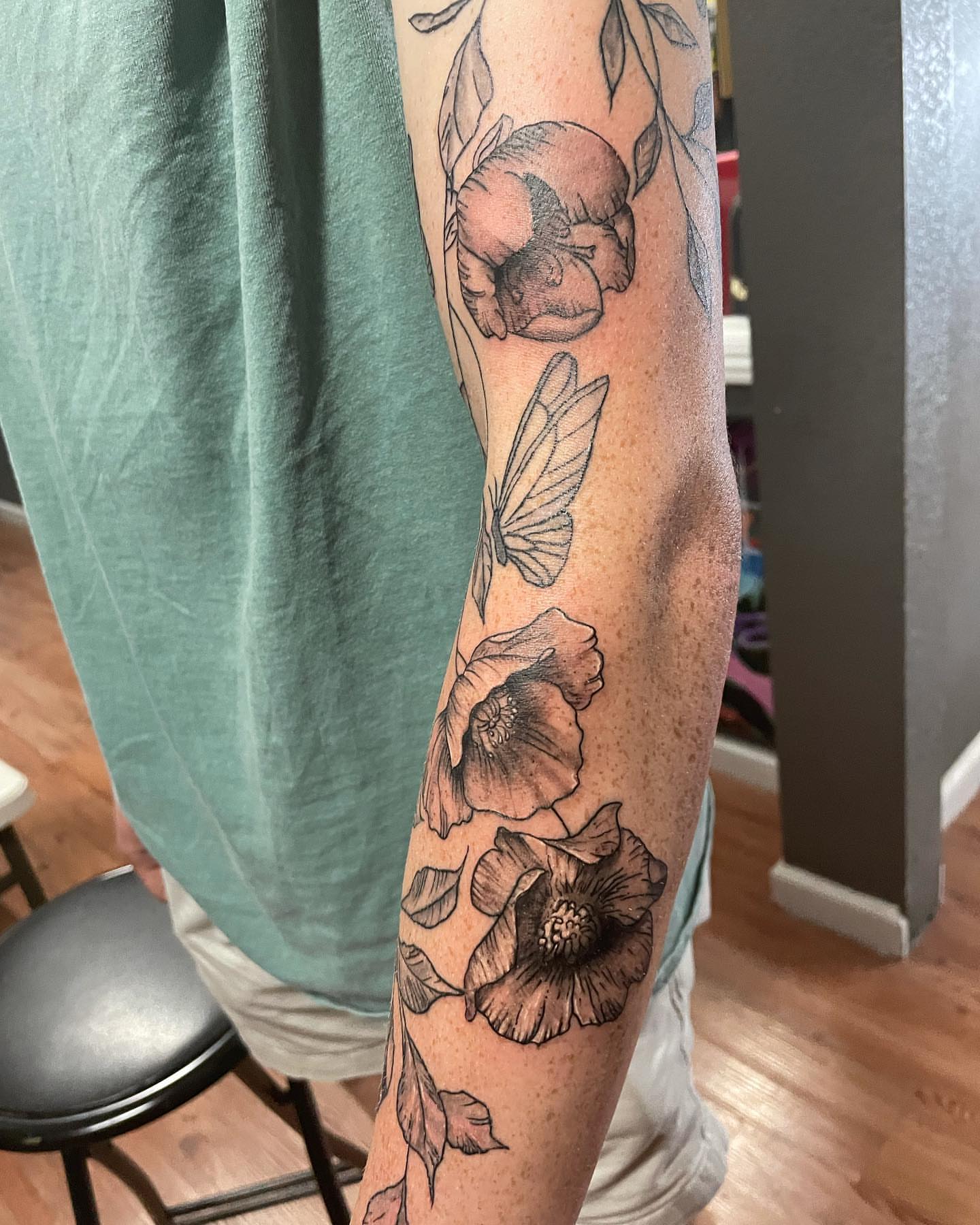 Flowers and butterfly black and grey tattoo on the forearm by Immortal BAYAREA TATTOO ARTIST
