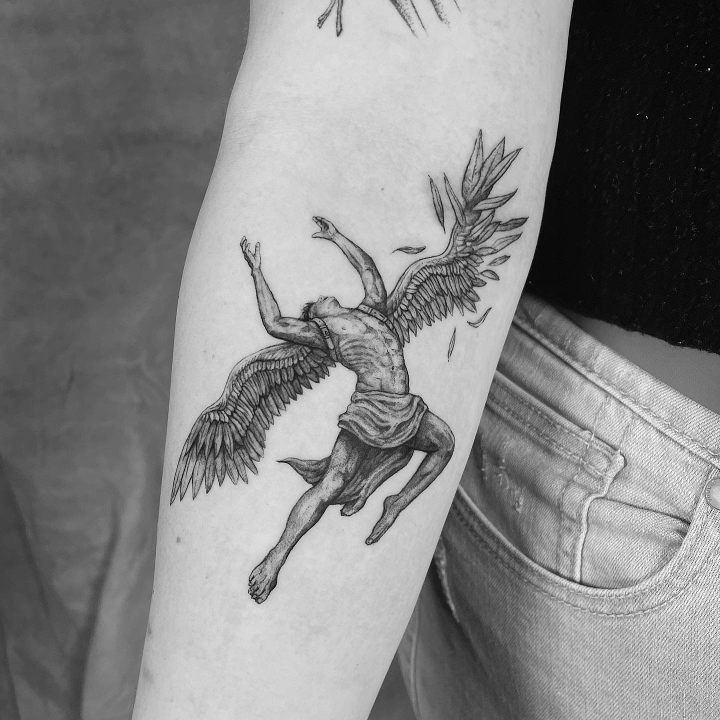 Angelic figure black and grey tattoo on the forearm by eugene k 🌈, San Francisco, California
