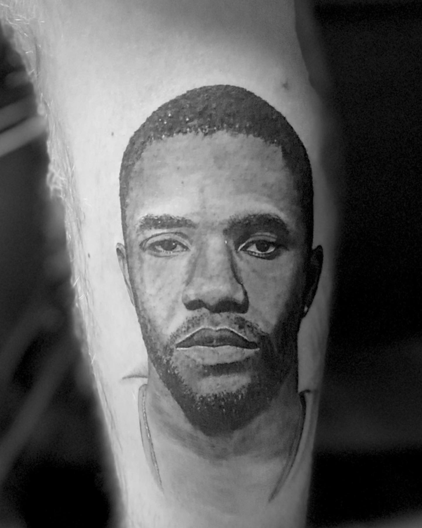 Portrait realism tattoo on the forearm by Jeremiah Warner