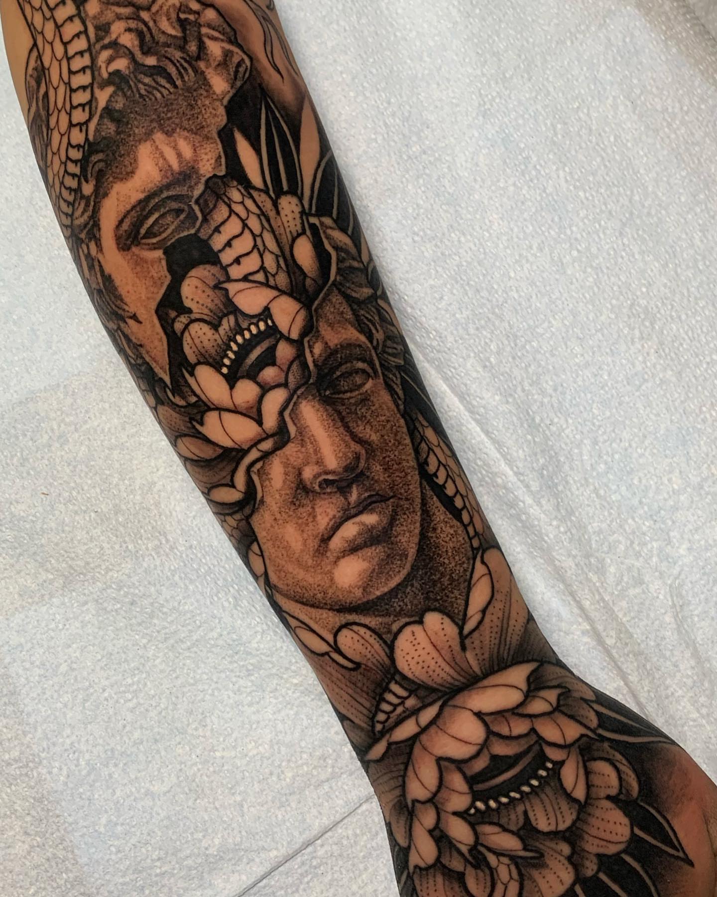 Medusa realism tattoo on the forearm by Forrest Henderson 森