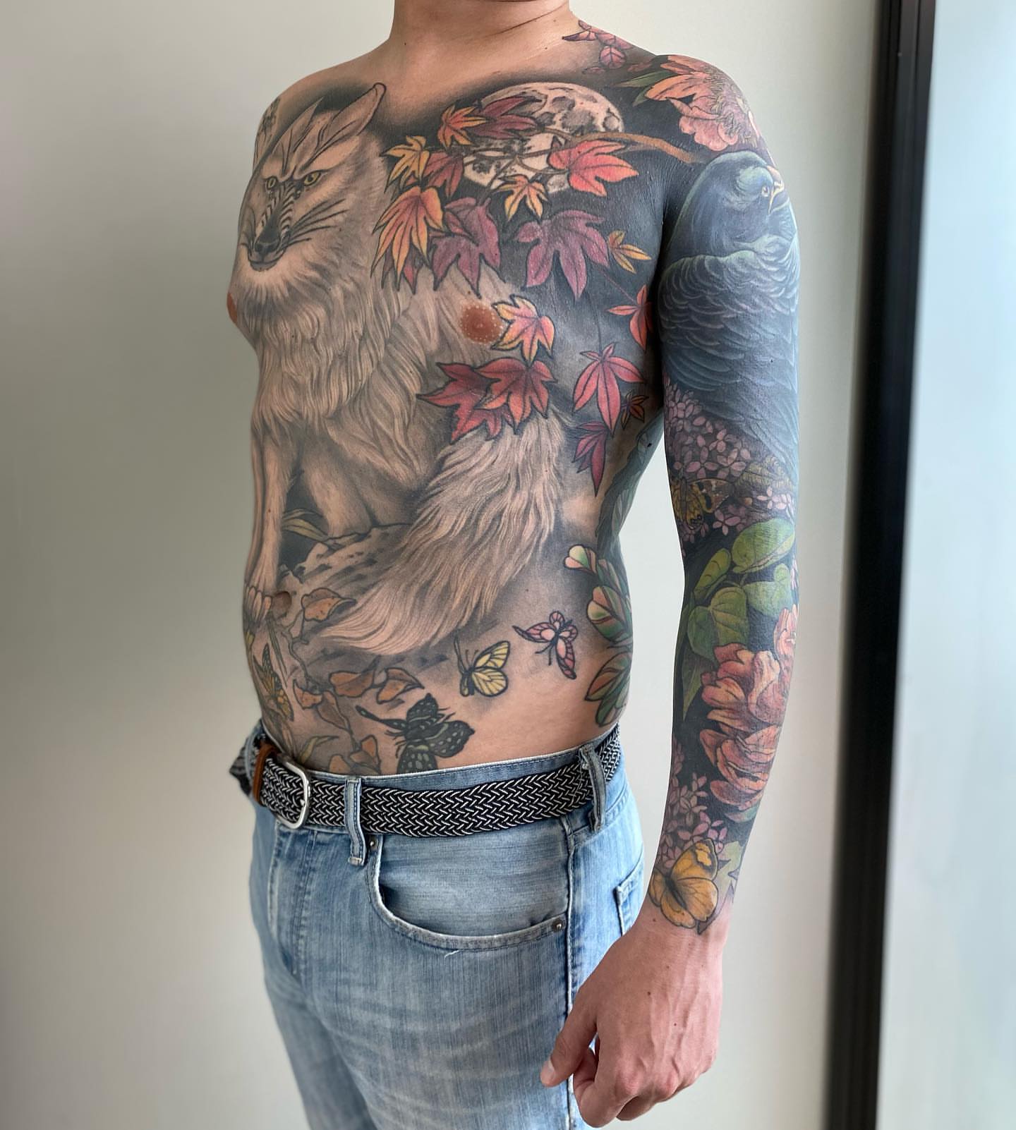 Fox and autumn leaves realism tattoo on the torso by Rusty Indigo