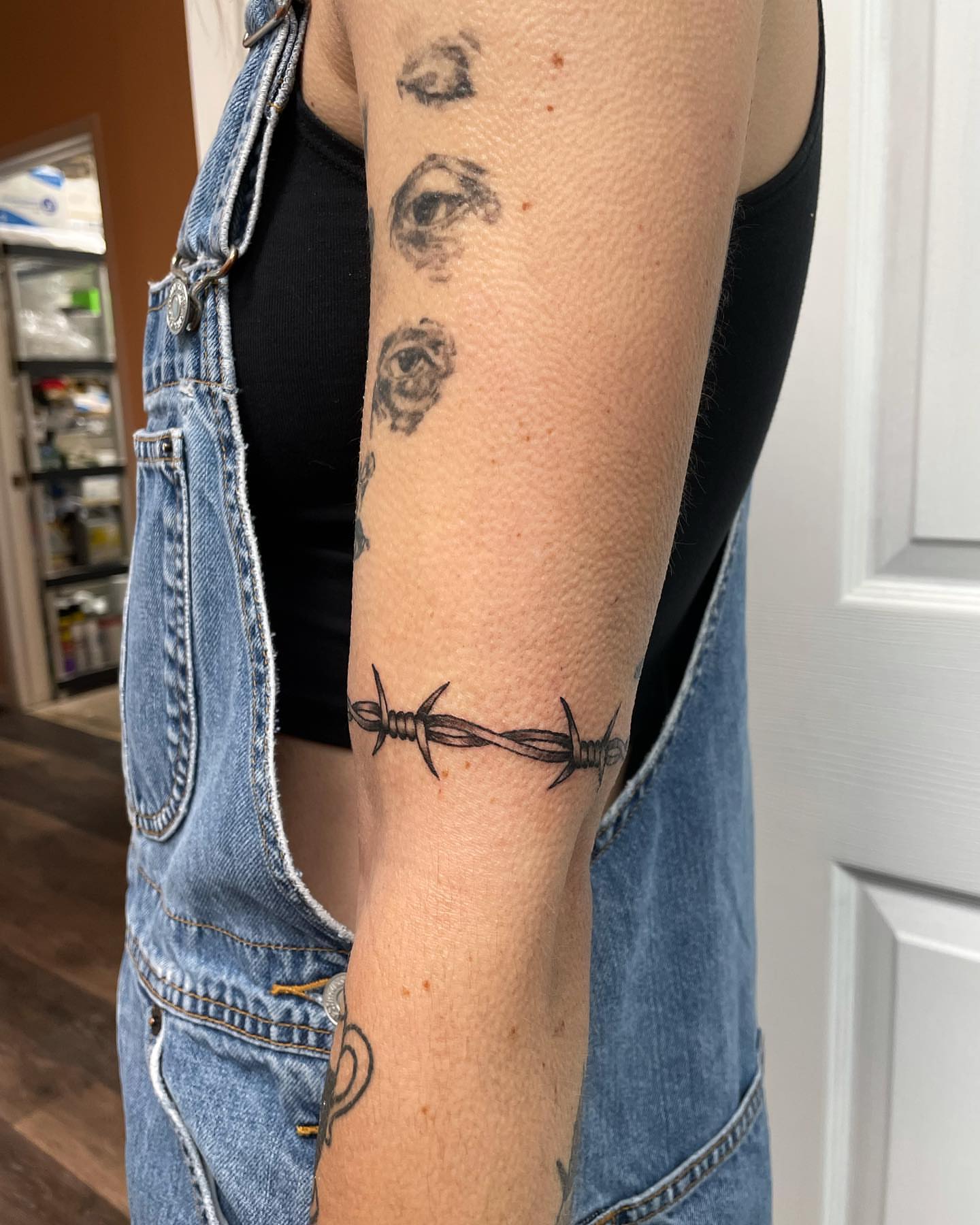 Barbed wire black and grey tattoo on the forearm by Jenn ★ Reid
