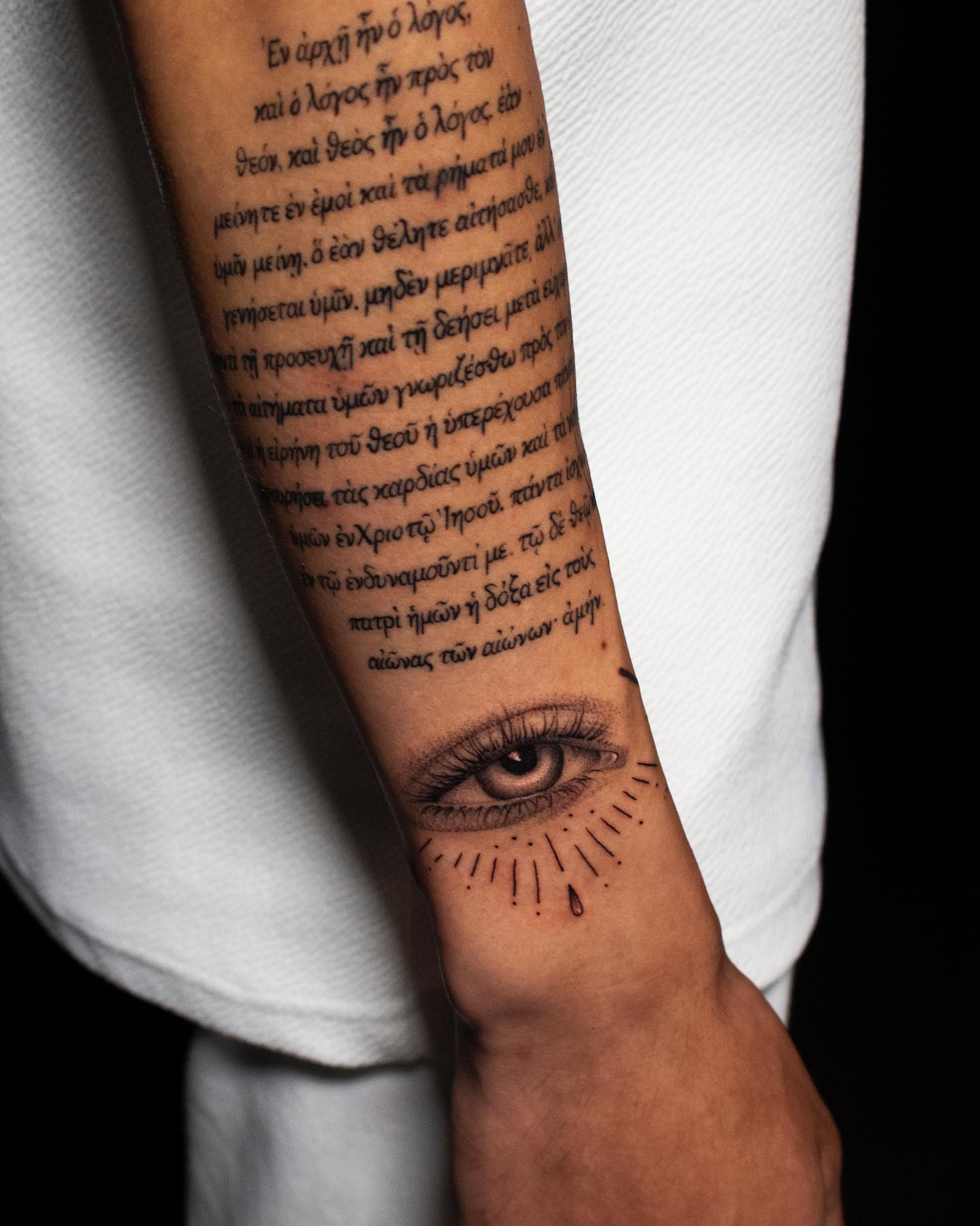 Eye black and grey tattoo on the forearm by Nikita Grinenko, San Francisco